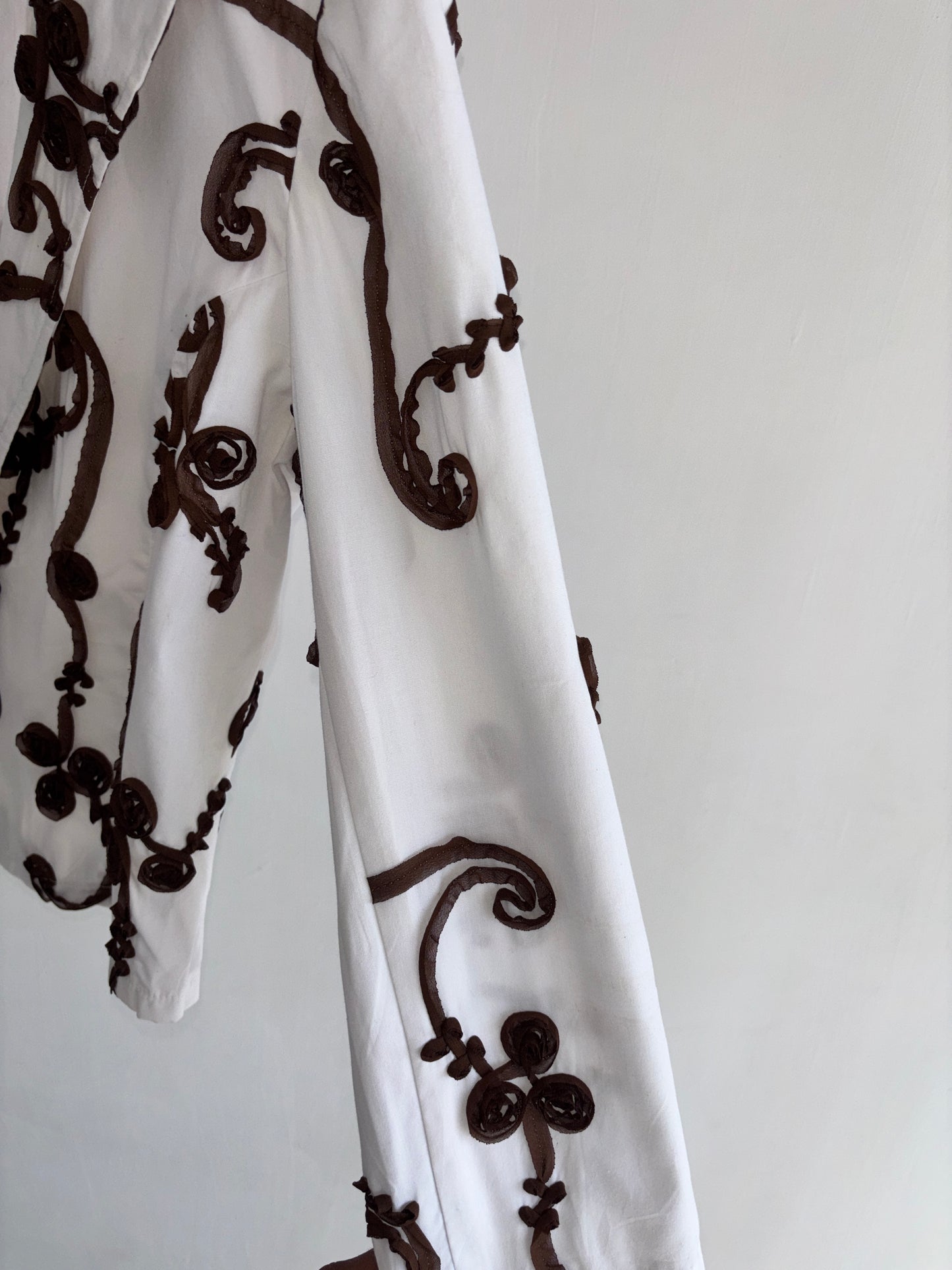 White and brown blazer