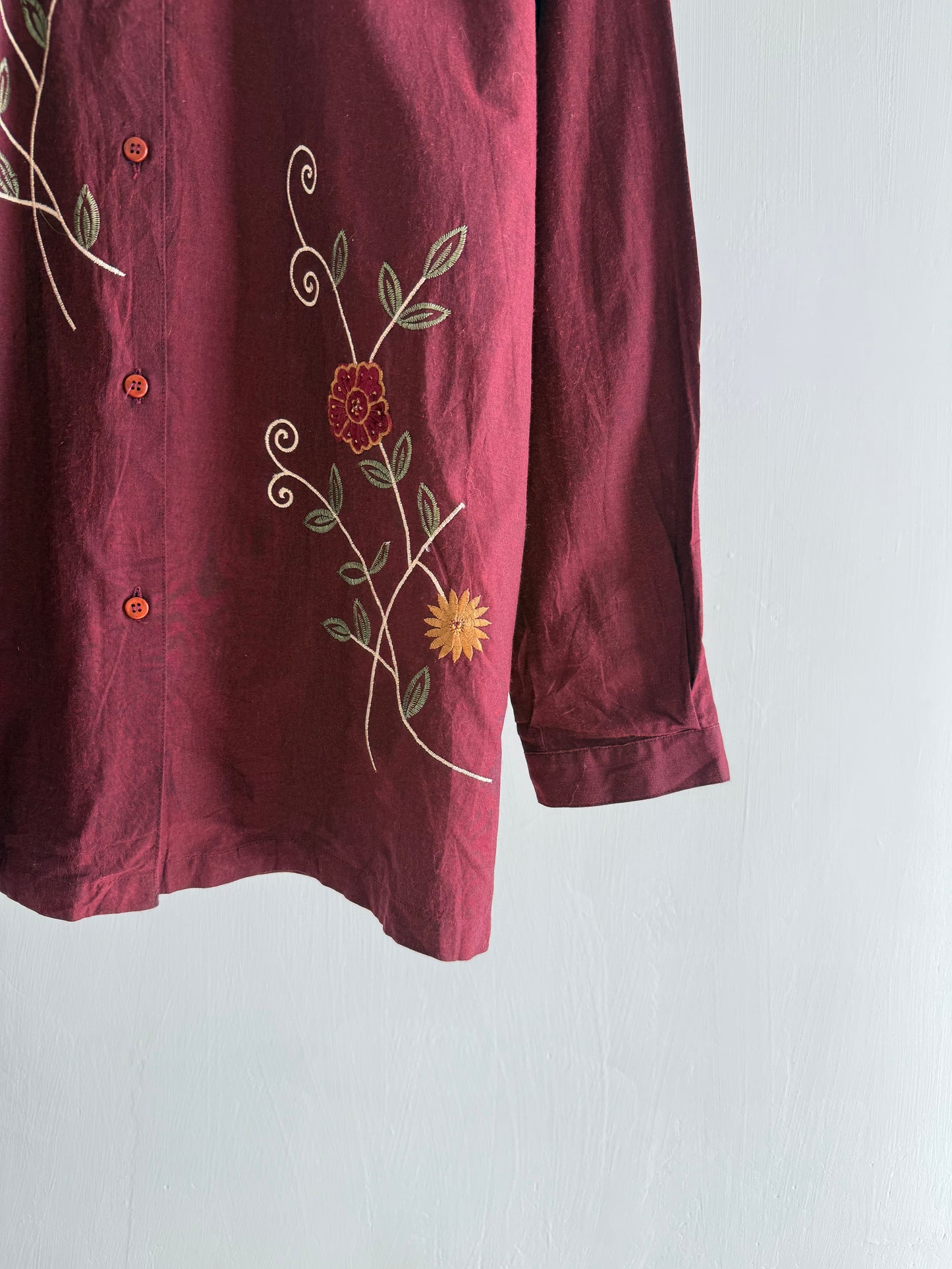 Embroidered maroon shirt