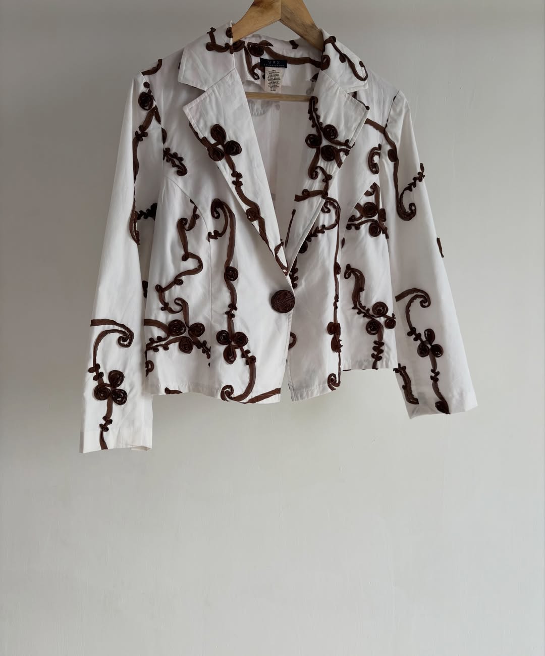 White and brown blazer