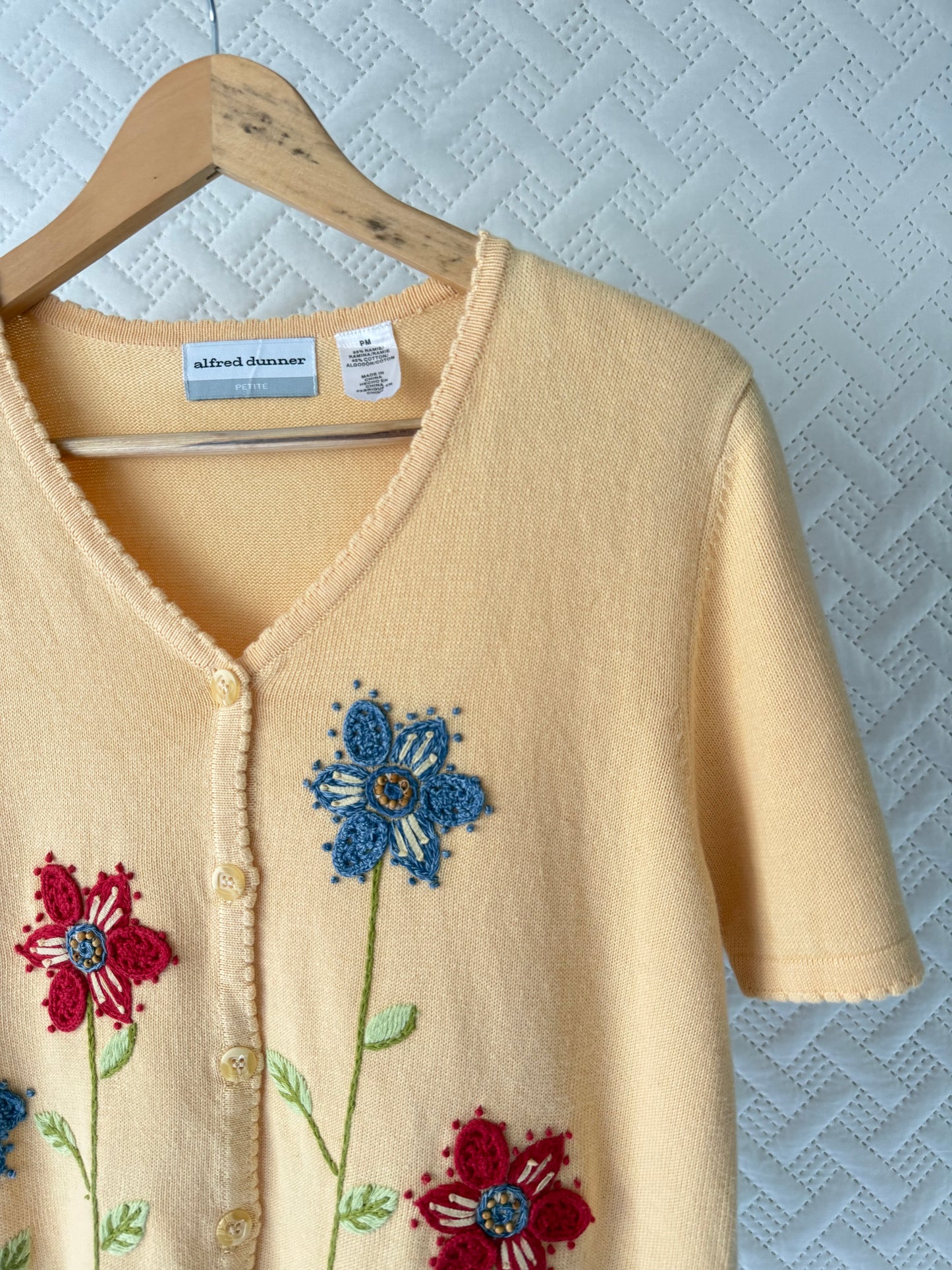 Embroidered floral knit top