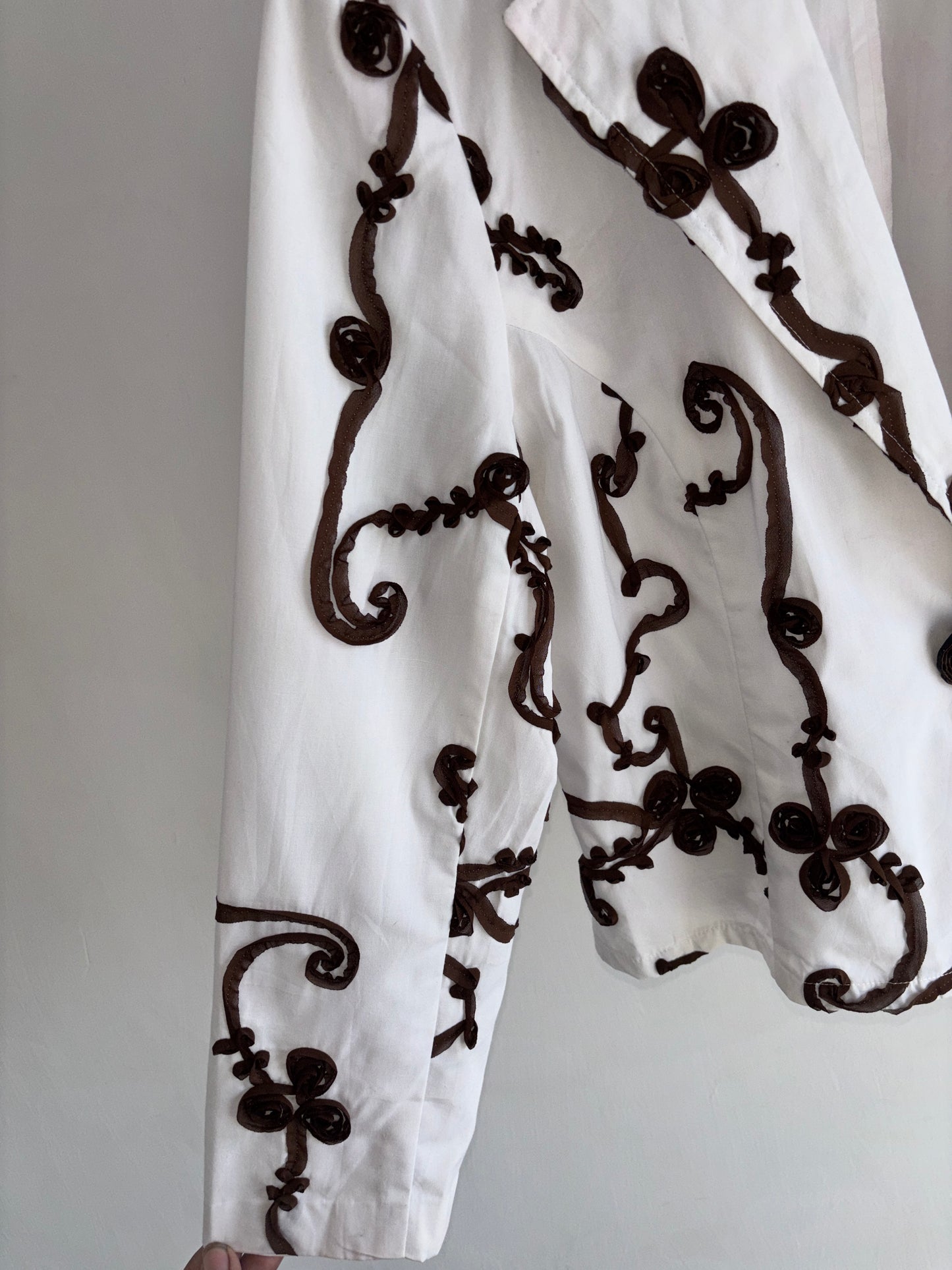 White and brown blazer