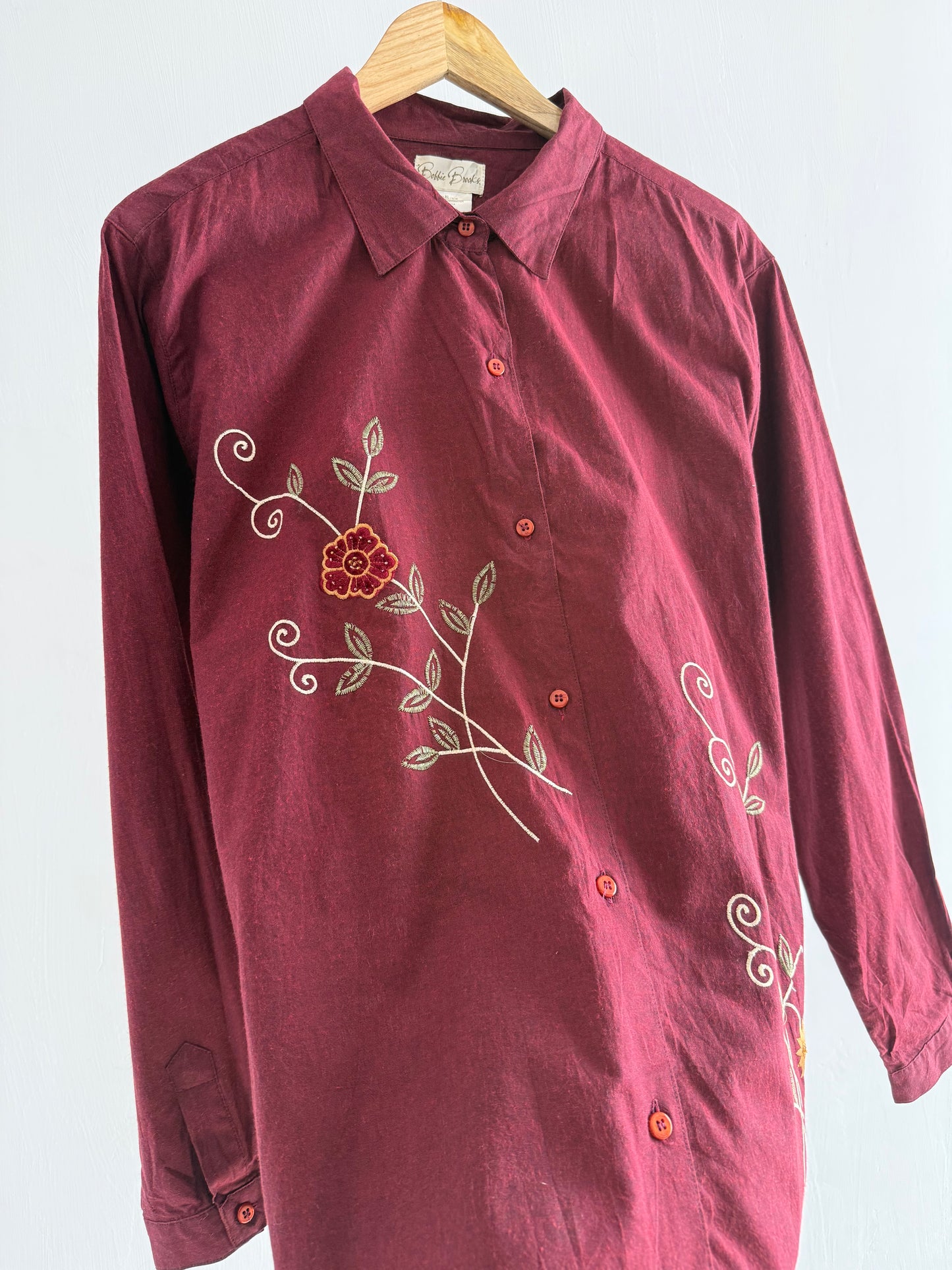 Embroidered maroon shirt